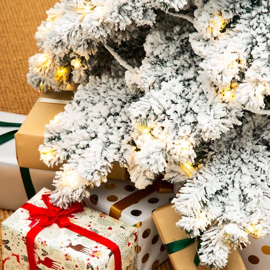 9ft. Pre-Lit Flocked Layered Spruce Artificial Christmas Tree, Warm White LED Lights